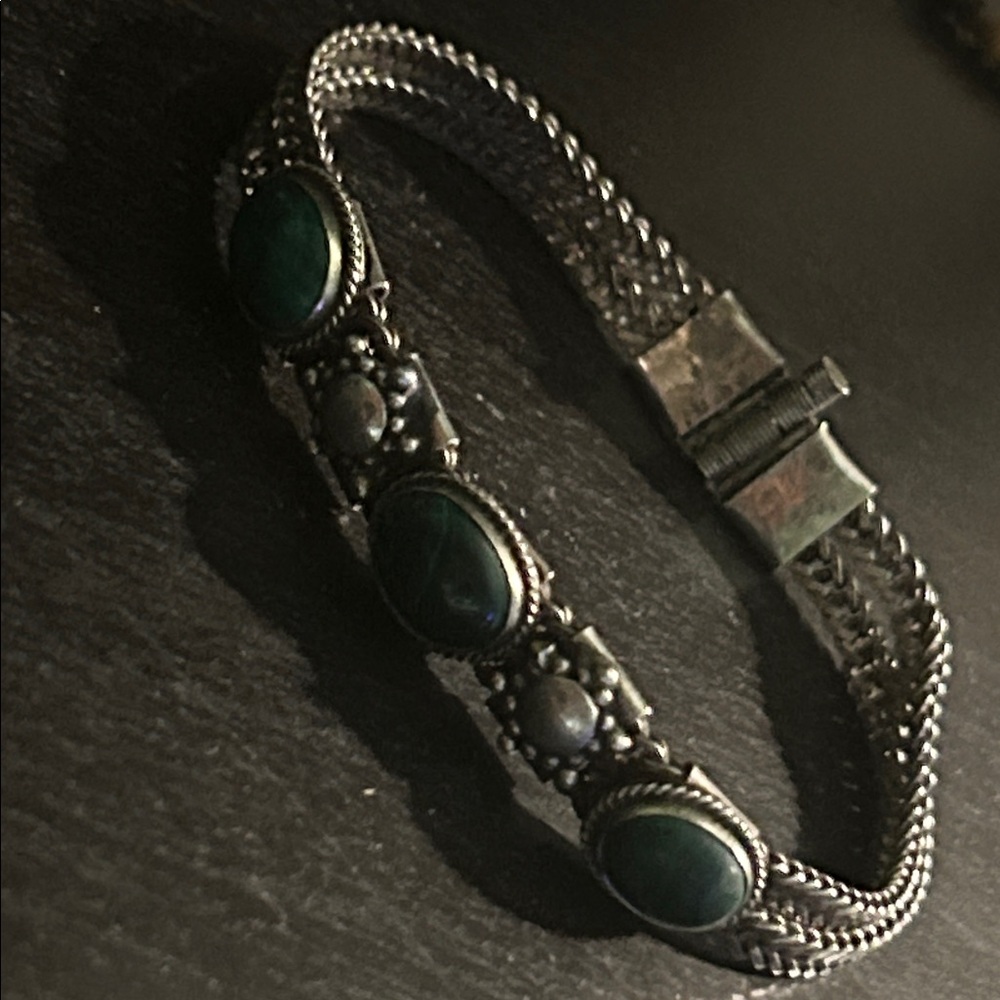 sterling silver and green malachite bracelet with a pin closure which